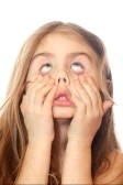 5768385-little-girl-making-a-scary-face-over-white-background